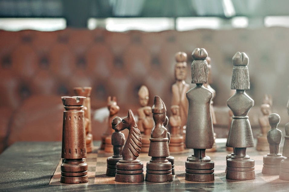 A chess board with subtle sunlight coming into the room