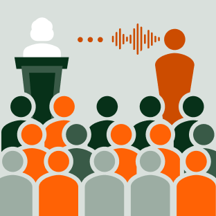 Interpreter at a large event interpreting after a pause