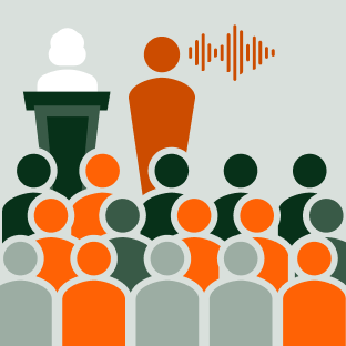 Interpreter at a large event interpreting simultaneously
