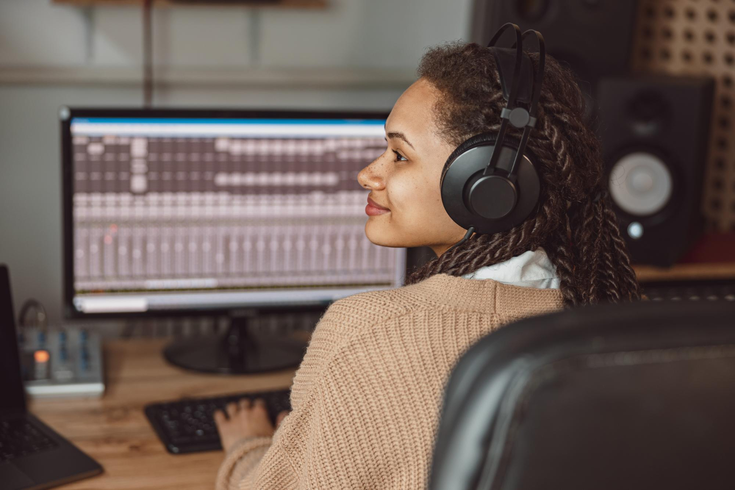 An audio technician updates the audio of a video