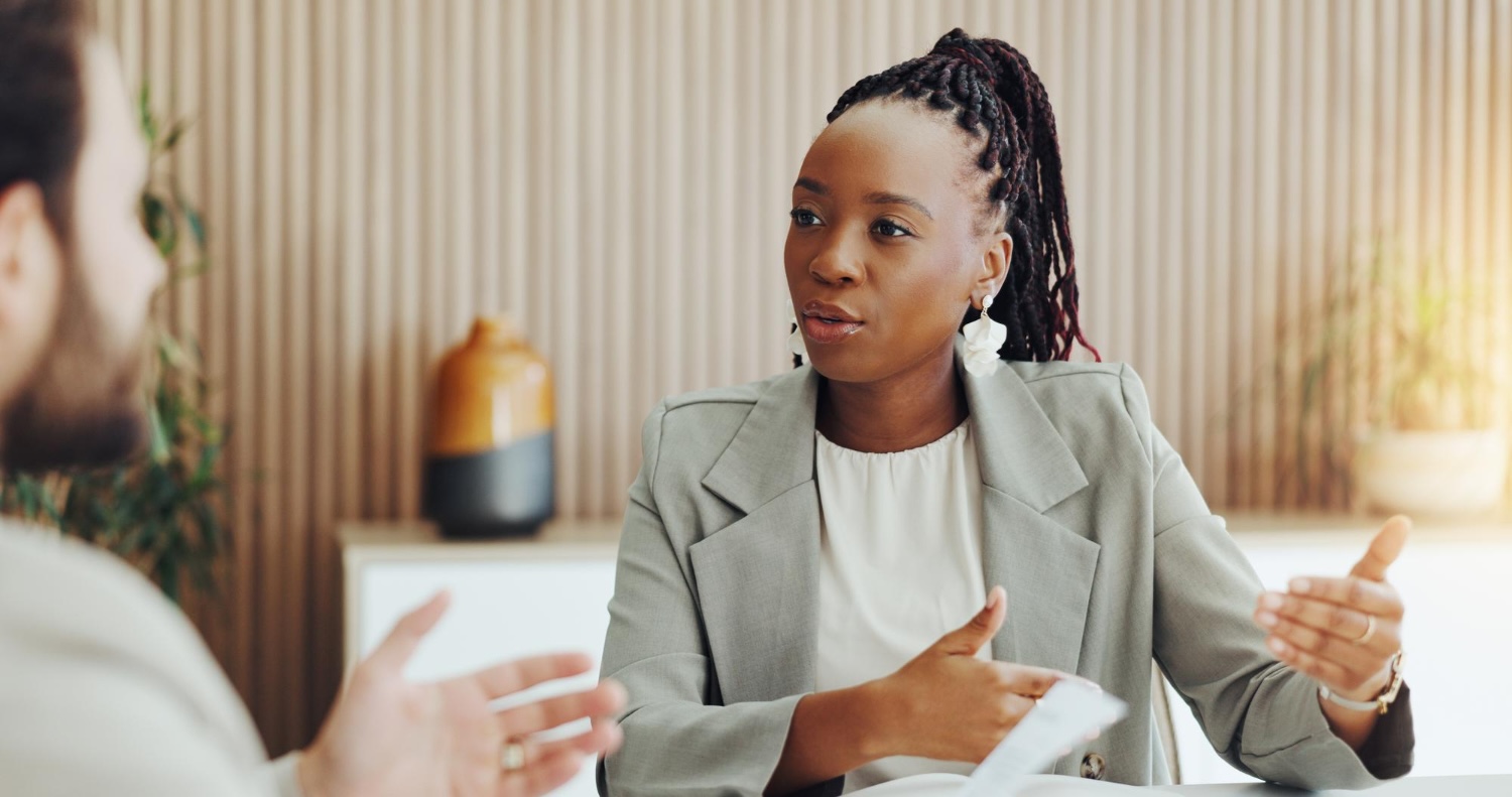 A peter and clark translation specialist speaks to a client